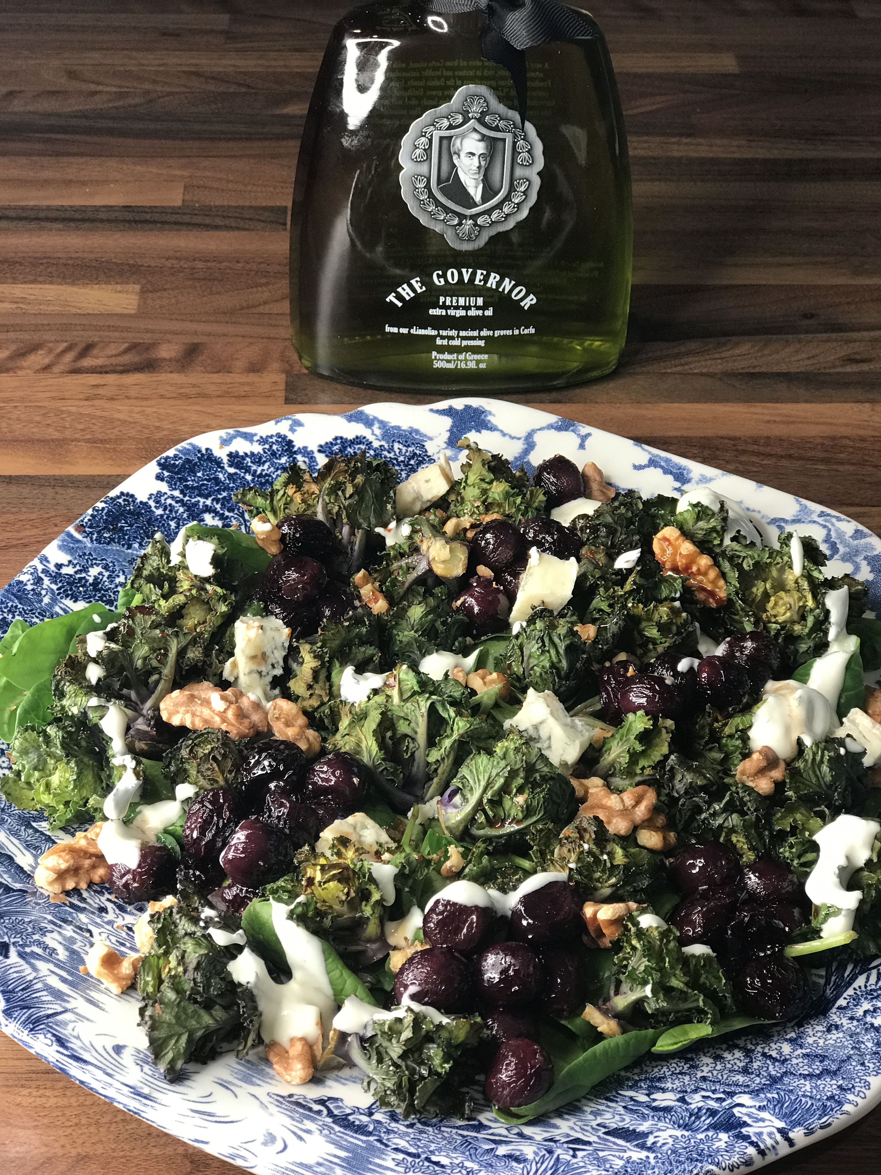 Kalette salad with roasted grapes, walnuts and a healthier blue cheese dressing